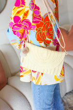 Raffia Flap Closure Clutch Bag with Wrist Strap and Pom Pom