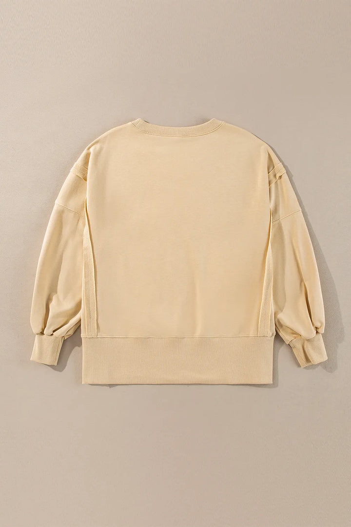 Exposed Seam Round Neck Long Sleeve Sweatshirt