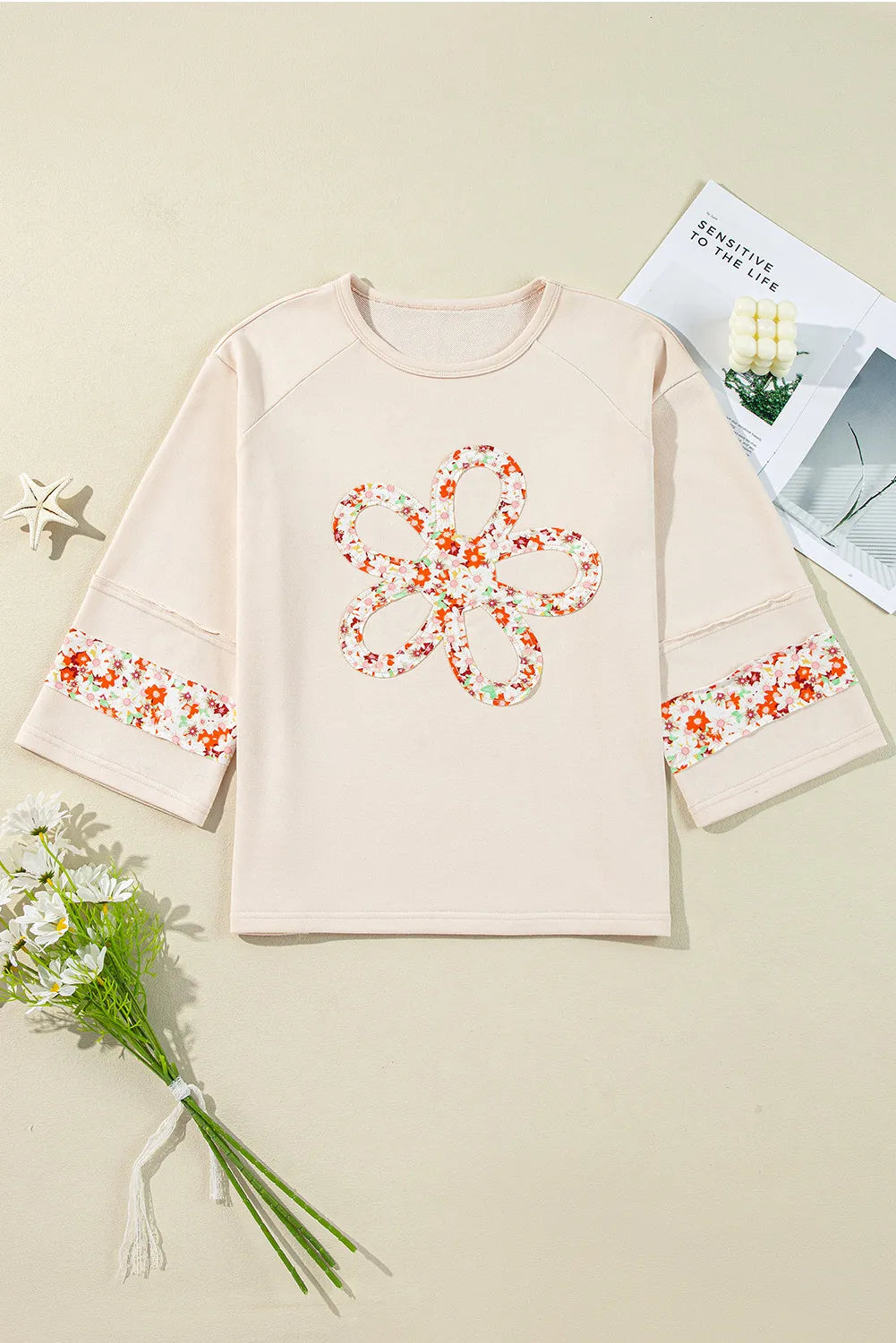 Exposed Seam Slit Floral Round Neck Blouse