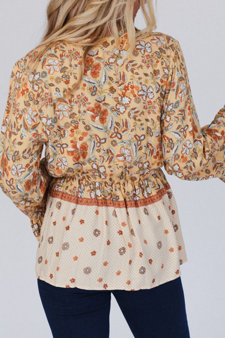 Peplum Printed Surplice Flare Sleeve Blouse