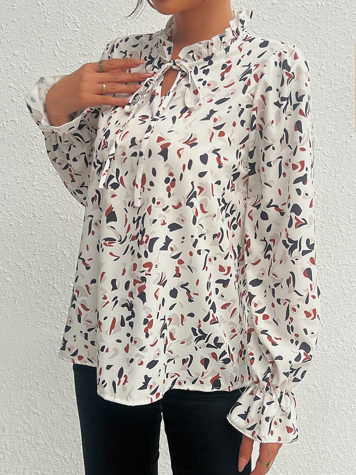 Ruffled Printed Tie Neck Long Sleeve Blouse